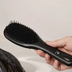 Brosse massante 2-en-1 Noire